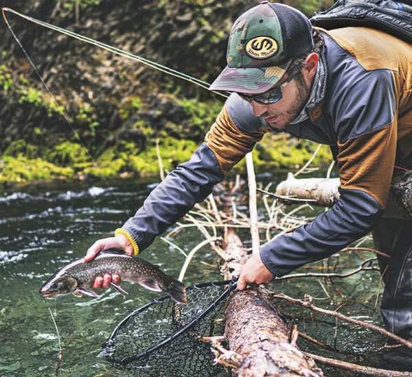 Fishing guiding wade fishing for dolly varden
